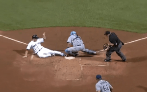 Nava sliding into home